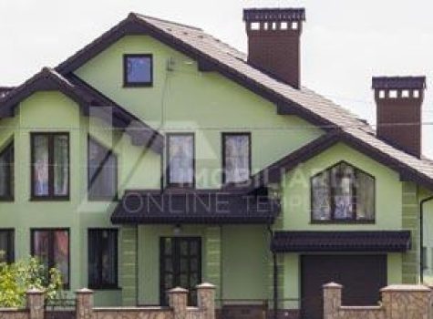 imagem de uma mansão na cor verde